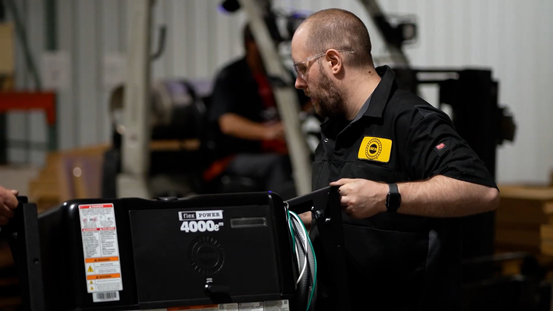 Flex Power technician checking a generator in the Ohio shop